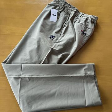 Ｍサイズ 新品サラッと快適 FILA フィラ吸汗速乾ウエスト楽らくパンツ　ウエスト76-84股下丈75 ライトカーキ