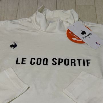新品★ルコック ゴルフ le coq sportif GOLF フロントロゴ ストレッチフォーサー WARM 保温 長袖モックネックシャツ/オフホワイト/サイズL