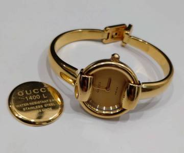 1円～ ジャンク 不動品 GUCCI グッチ 1400L バングルウォッチ ゴールド 金 文字盤 腕時計 レディース 